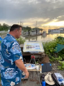 Artist painting at the waterfront in Steveston